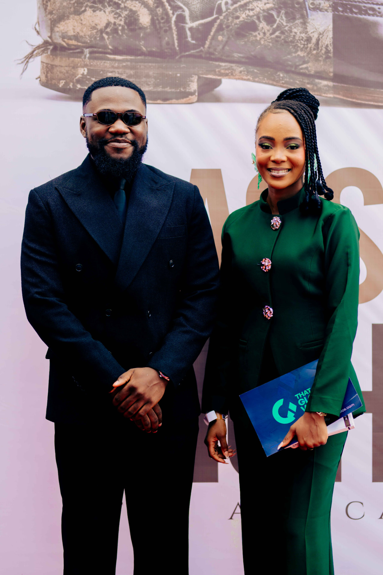 M.N. Onyeachor with a guest at the launch backdrop